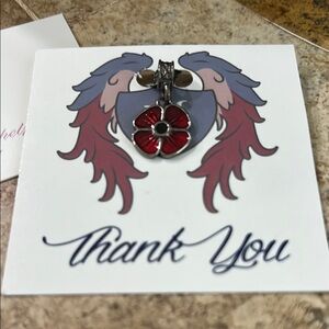 Nomad Collection Red and Silver flower charm